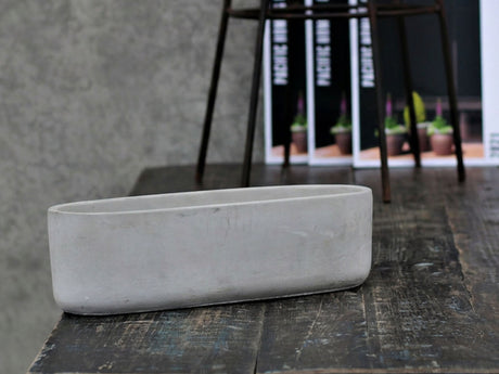 Low Oval Concrete Planter By Plantatorem